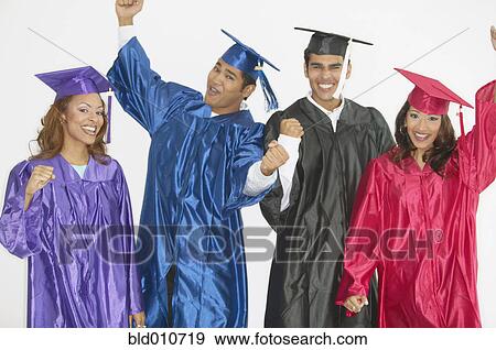 Stock Photo - Group of graduates wearing caps and gowns. Fotosearch