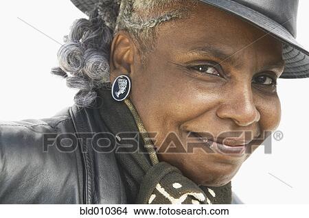 Portrait of a smiling woman View Large Photo Image Picture - Portrait of a smiling woman. Fotosearch