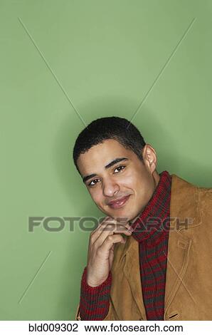 Stock Image - Portrait of a smiling young man. Fotosearch