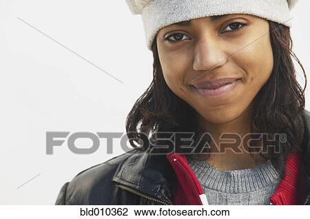 Portrait of a teenage girl smiling View Large Photo Image Stock Image - Portrait of a teenage girl smiling. Fotosearch