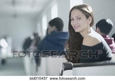 Portrait of a teenage girl smiling View Large Photo Image Stock Photo - Portrait of a teenage girl smiling. Fotosearch