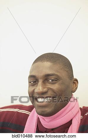 Portrait of a young man smiling View Large Photo Image Stock Photo - Portrait of a young man smiling. Fotosearch