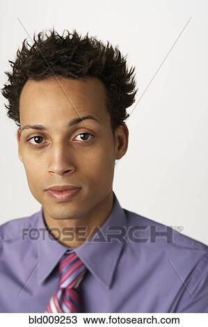 Portrait of a young man View Large Photo Image Stock Image - Portrait of a young man. Fotosearch