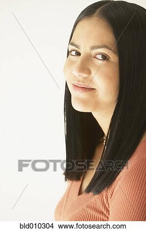 Picture - Portrait of a young woman smiling. Fotosearch