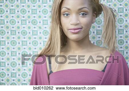 Portrait of a young woman View Large Photo Image Stock Image - Portrait of a young woman. Fotosearch