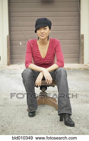 Portrait of a young woman View Large Photo Image Stock Photo - Portrait of a young woman. Fotosearch