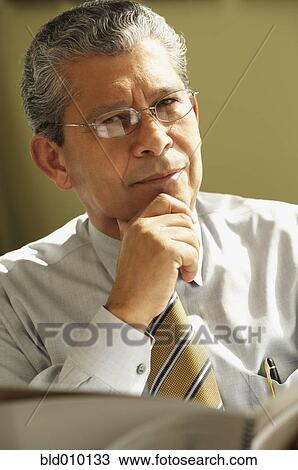 Stock Image - Portrait of businessman. Fotosearch