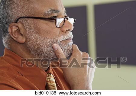 Stock Photo - Portrait of businessman. Fotosearch