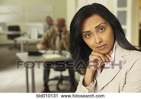 Stock Image - Portrait of businesswoman. Fotosearch