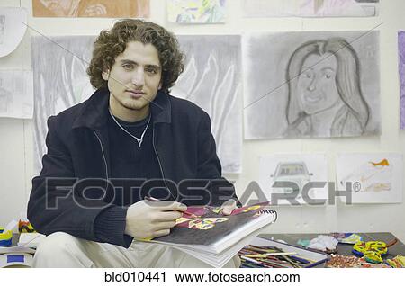 Portrait of teenage boy drawing picture View Large Photo Image Stock Image - Portrait of teenage boy drawing picture. Fotosearch