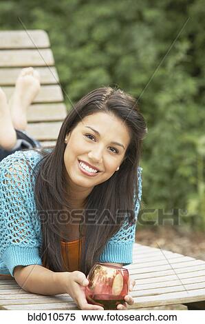 Portrait of woman holding wineglass View Large Photo Image Stock Photography - Portrait of woman holding wineglass. Fotosearch