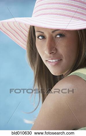Portrait of young woman smiling View Large Photo Image Stock Image - Portrait of young woman smiling. Fotosearch
