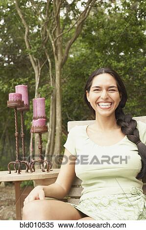 Portrait of young woman smiling View Large Photo Image Stock Photography - Portrait of young woman smiling. Fotosearch