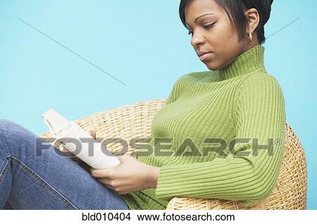 Woman reading a book View Large Photo Image Picture - Woman reading a book. Fotosearch