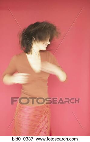 Young woman dancing View Large Photo Image Stock Photo - Young woman dancing. Fotosearch