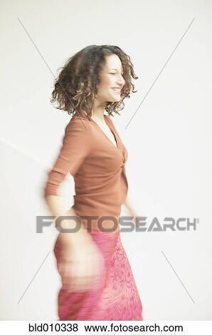 Young woman dancing View Large Photo Image Stock Photo - Young woman dancing. Fotosearch