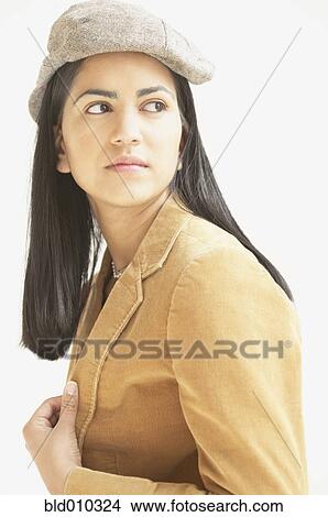 Picture - Young woman looking sideways. Fotosearch