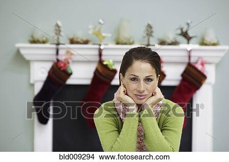 Picture - Young woman prepared for Christmas. Fotosearch