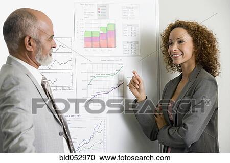 African businesspeople next to graphs View Large Photo Image Stock Image - African businesspeople next to graphs. Fotosearch