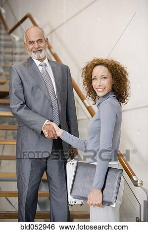 African businesspeople shaking hands View Large Photo Image Stock Photograph - African businesspeople shaking hands. Fotosearch