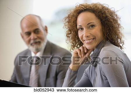 African businesswoman resting chin on hand View Large Photo Image Stock Image - African businesswoman resting chin on hand. Fotosearch