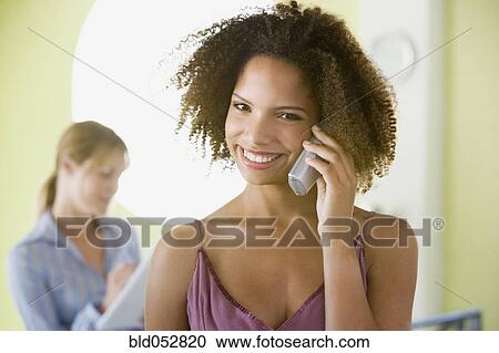 African businesswoman taking on telephone View Large Photo Image Stock Image - African businesswoman taking on telephone. Fotosearch