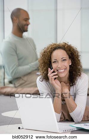 African businesswoman talking on cell phone View Large Photo Image Stock Image - African businesswoman talking on cell phone. Fotosearch