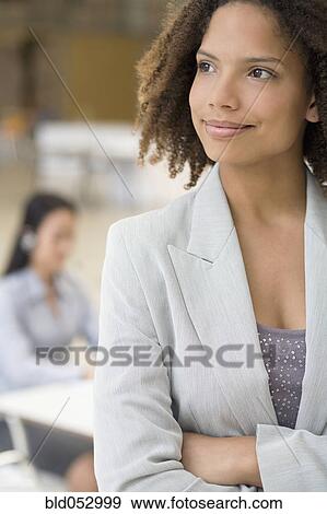 African businesswoman with arms crossed View Large Photo Image Stock Photo - African businesswoman with arms crossed. Fotosearch