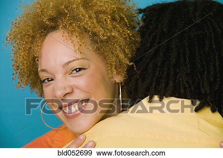 African couple hugging View Large Photo Image Stock Photo - African couple hugging. Fotosearch