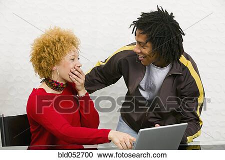 African couple laughing View Large Photo Image Stock Image - African couple laughing. Fotosearch