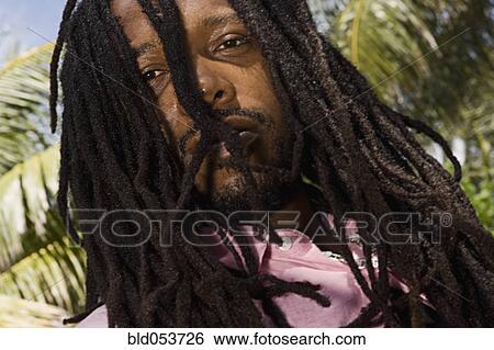 Stock Photograph - African man with dreadlocks. Fotosearch
