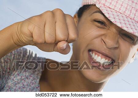 African woman making fist View Large Photo Image Stock Image - African woman making fist. Fotosearch
