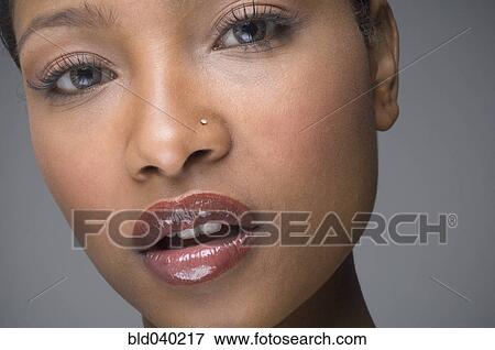 Stock Photo - African woman with nose ring. Fotosearch
