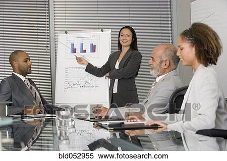 Asian businesswoman giving presentation View Large Photo Image Stock Photography - Asian businesswoman giving presentation. Fotosearch
