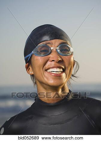 Asian woman wearing wetsuit and goggles View Large Photo Image Stock Photo - Asian woman wearing wetsuit and goggles. Fotosearch