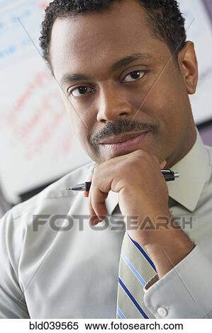 Close up of African businessman View Large Photo Image Stock Photography - Close up of African businessman. Fotosearch