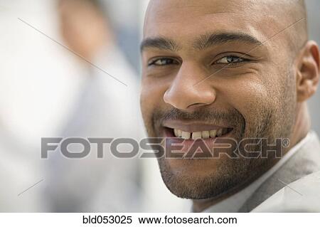 Stock Photography - Close up of African man smiling. Fotosearch