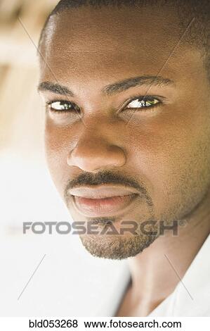 Close up of African man's face View Large Photo Image Stock Photo - Close up of African man's face. Fotosearch