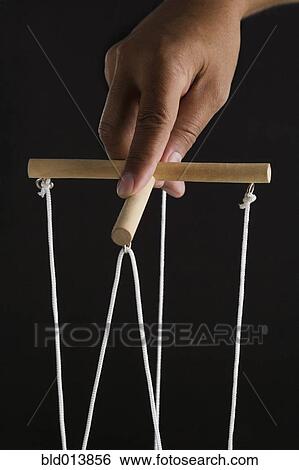 Close up of hand playing with puppet View Large Photo Image Stock Photograph - Close up of hand playing with puppet . Fotosearch