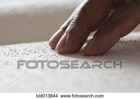 Close up of hand reading Braille View Large Photo Image Picture - Close up of hand reading Braille . Fotosearch