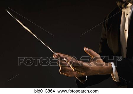 Picture - Close up of hands conducting. Fotosearch
