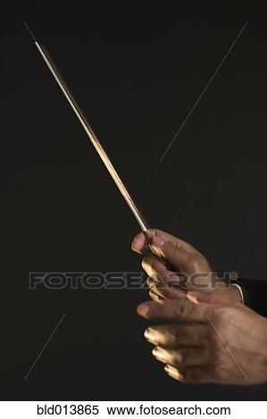 Stock Photography - Close up of hands conducting. Fotosearch