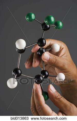 Close up of hands holding model View Large Photo Image Stock Image - Close up of hands holding model. Fotosearch