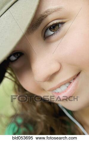 Close up of Hispanic teenaged girl smiling View Large Photo Image Stock Photography - Close up of Hispanic teenaged girl smiling. Fotosearch