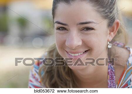 Close up of Hispanic woman smiling View Large Photo Image Stock Image - Close up of Hispanic woman smiling. Fotosearch
