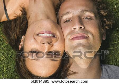 Close up portrait of couple head to head View Large Photo Image Stock Photography - Close up portrait of couple head to head. Fotosearch