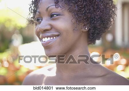Close up portrait of woman smiling View Large Photo Image Stock Image - Close up portrait of woman smiling. Fotosearch