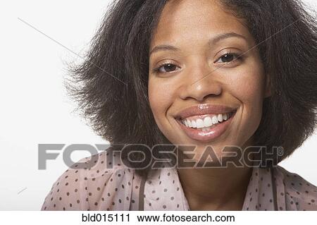 Close up portrait of woman smiling View Large Photo Image Stock Image - Close up portrait of woman smiling. Fotosearch