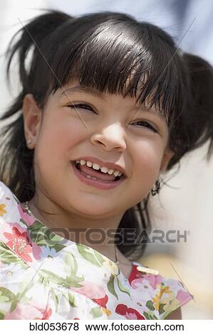 Hispanic girl laughing View Large Photo Image Stock Photo - Hispanic girl laughing. Fotosearch