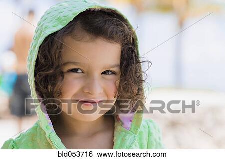 Hispanic girl wearing hooded sweatshirt View Large Photo Image Stock Photograph - Hispanic girl wearing hooded sweatshirt. Fotosearch
